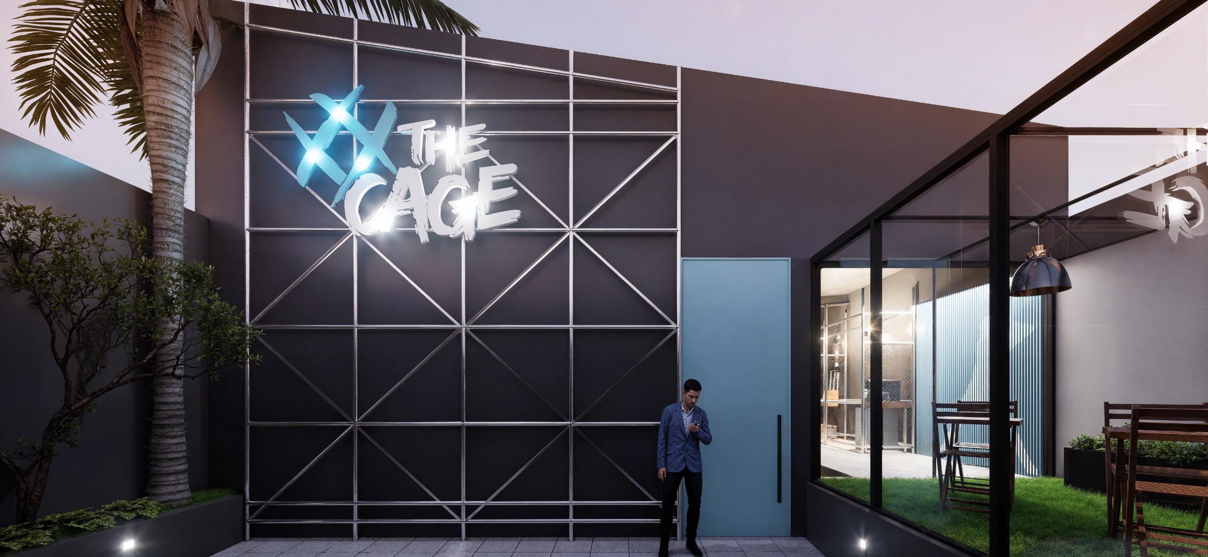 Fachada do The Cage ao anoitecer